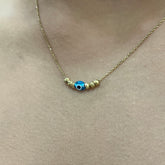 585 Gold Halskette mit Nazar Perle und goldenen Dorika-Elementen