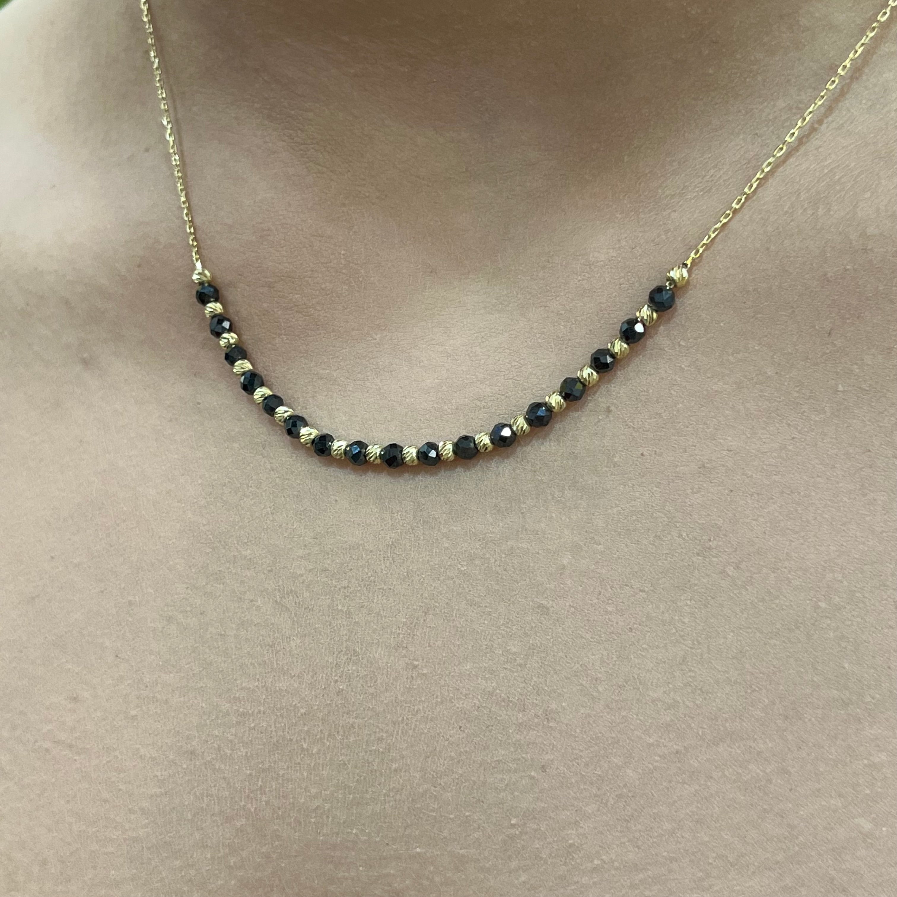 585 Gold Halskette mit schwarzen und goldenen Onyx-Perlen
