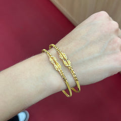 916 Liebesknoten Armreifen 22K Gold – Stilvolle Kombination mehrerer Armreifen