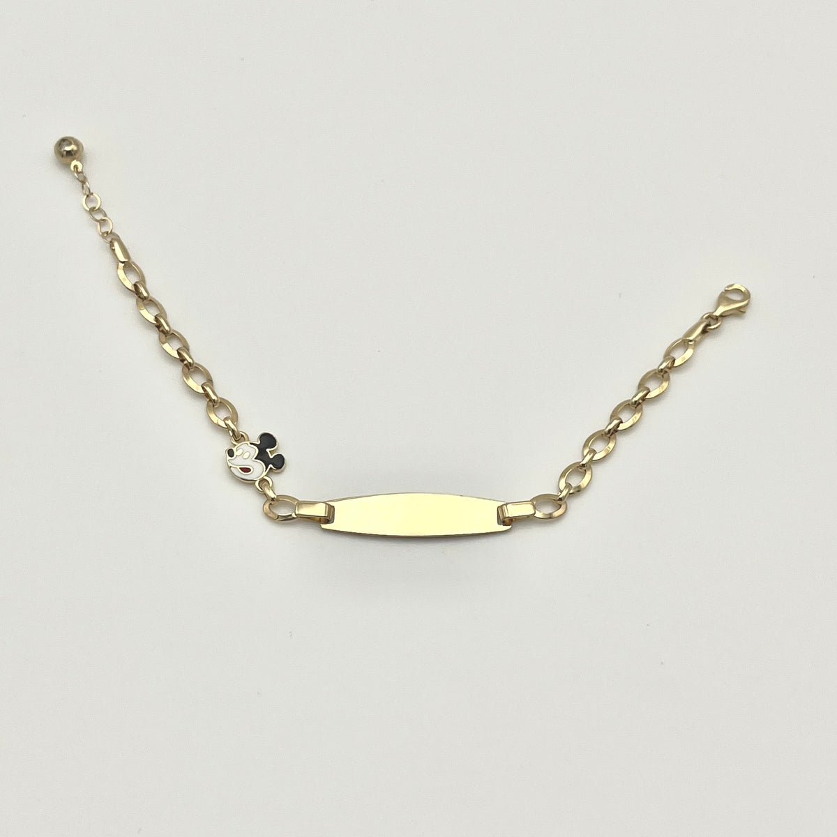 585 Micky Mouse Kinderarmband aus 14 Karat Gold mit Namensplatte