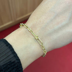 585 Gliederarmband aus 14K Gelbgold mit feinen ovalen Gliedern und Kugeldetails am Handgelenk